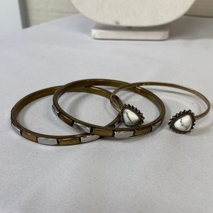 Three brass bracelets bangles and cuff style bracelet